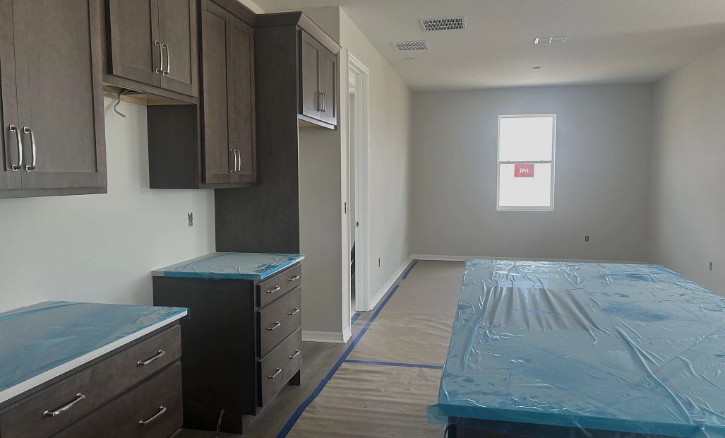 Kitchen walks you into the dining space - under construction