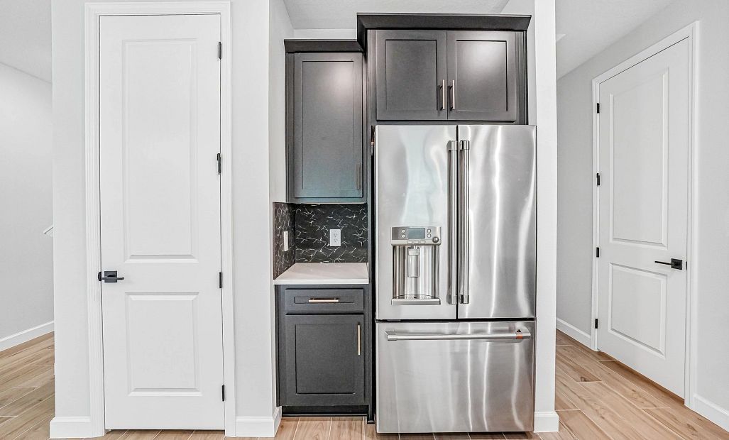 This home featuring beautiful stainless steel GE CAFÉ appliances