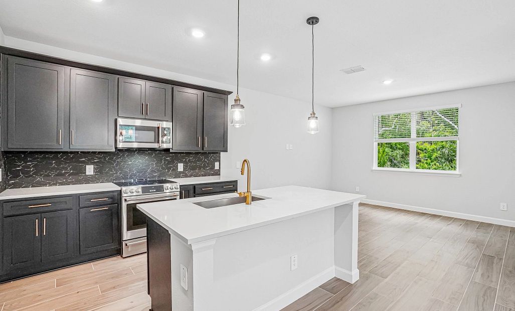 The kitchen features a spacious island