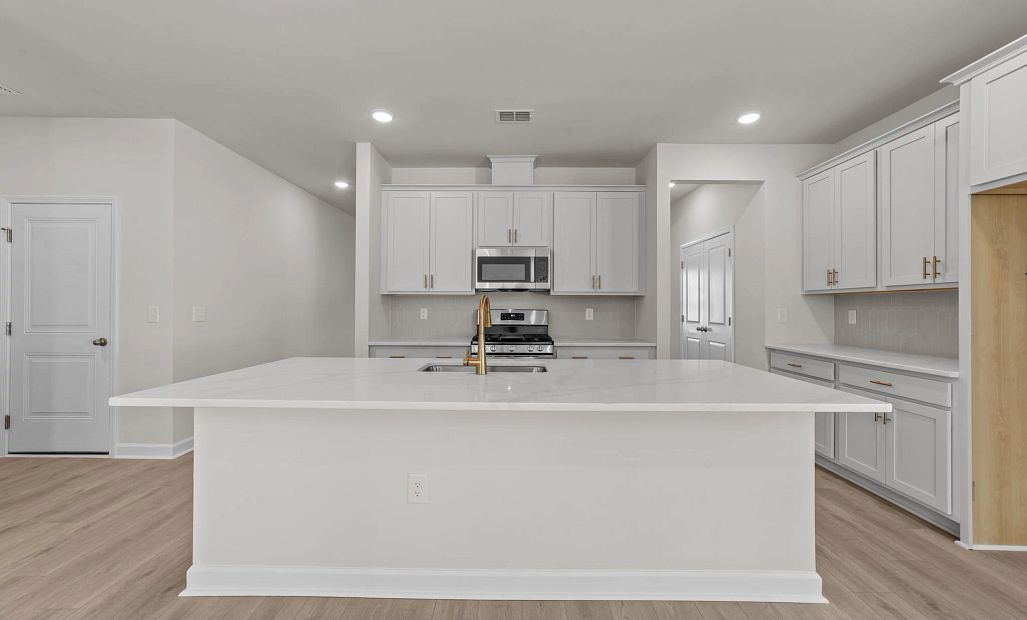 Similar Harrison floorplan. Photos are representative.