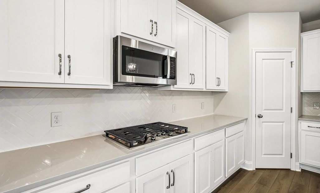 Kitchen featuring AW Collection® Timeless w/gas cooktop