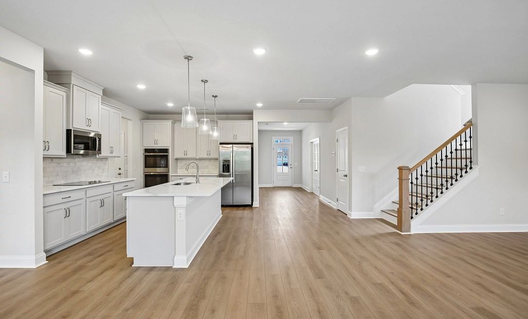 Foyer/Kitchen/Hardwood Stairs