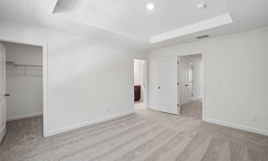 Spacious primary bedroom -  representative images
