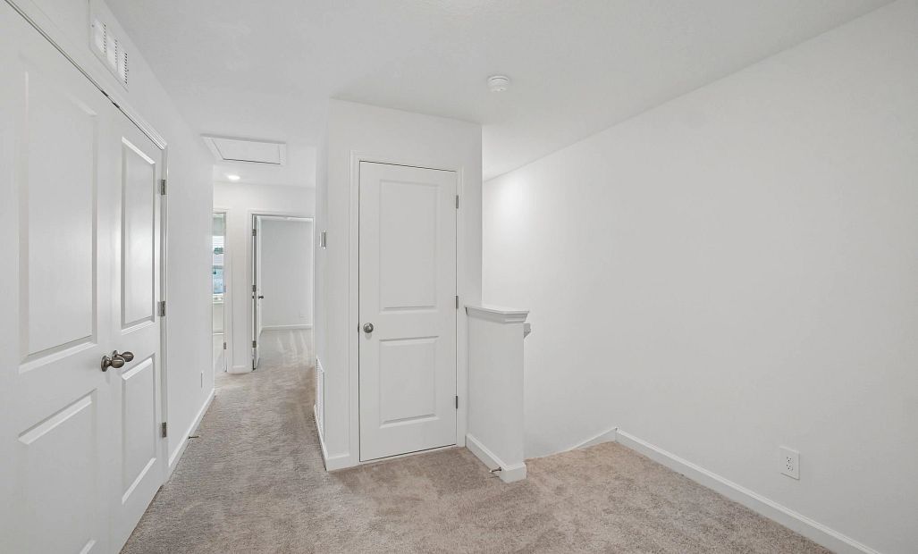 Down the hallway you will find the secondary bedrooms -  representative images