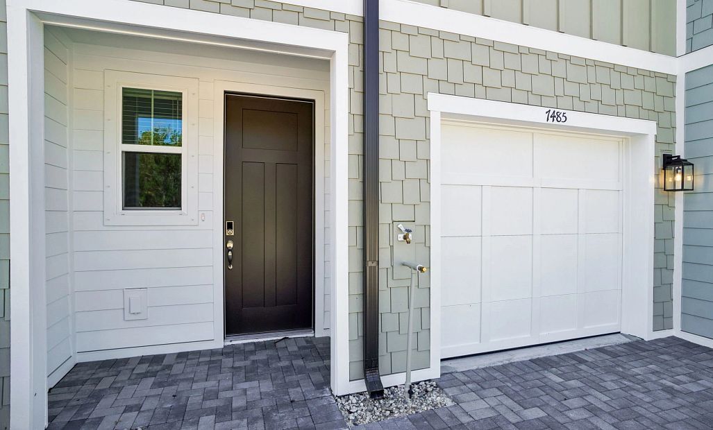 Covered front porch and one car garage