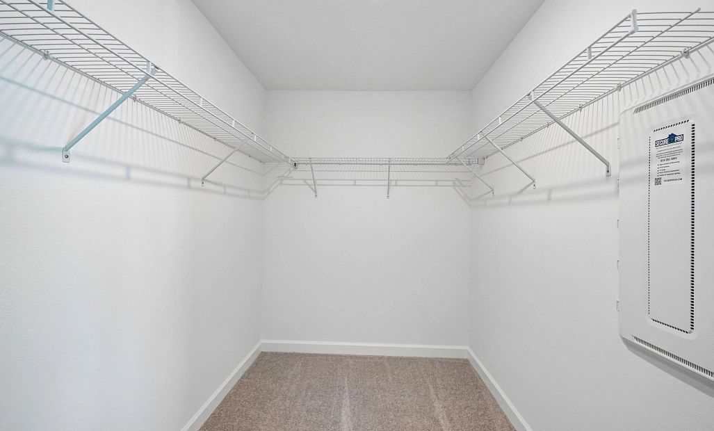 Spacious walk-in closet off the primary bedroom