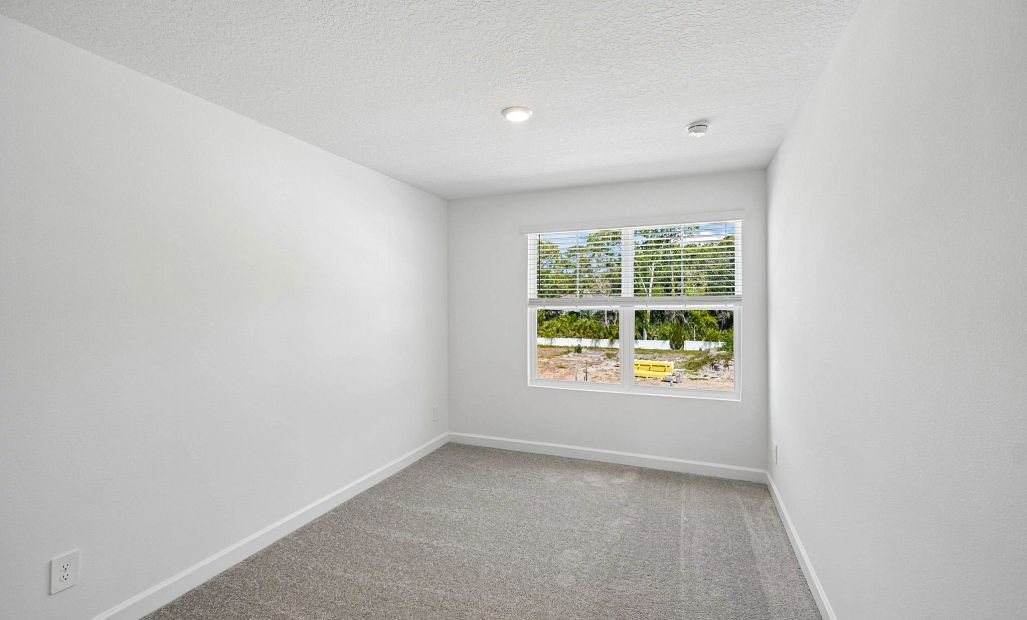 Bedroom 3 features a double window for extra light