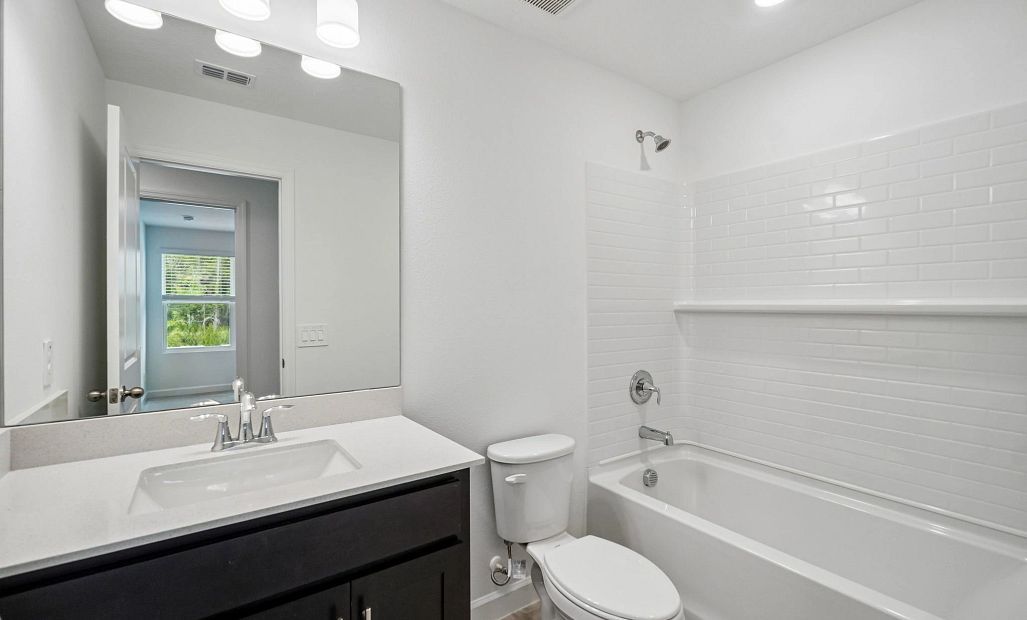 Bathroom 2 located off the hallway near bedroom 2 and 3