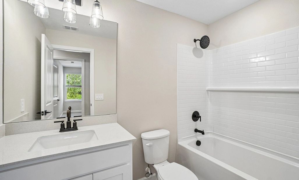 Bathroom 2 near bedroom 2 and 3 and features aspects of AW Collection® Harmony