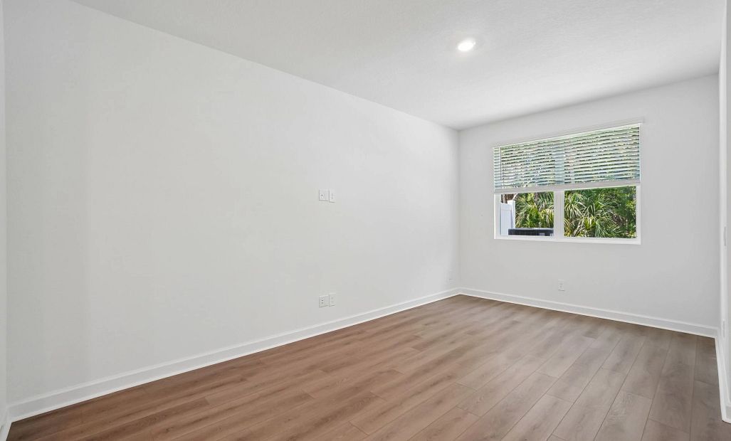 Spacious family room with a double window for extra natural light