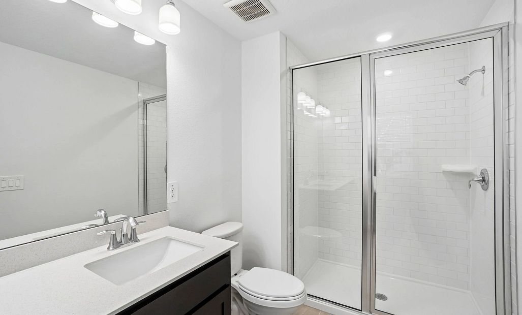 Primary bathroom with a large walk-in shower