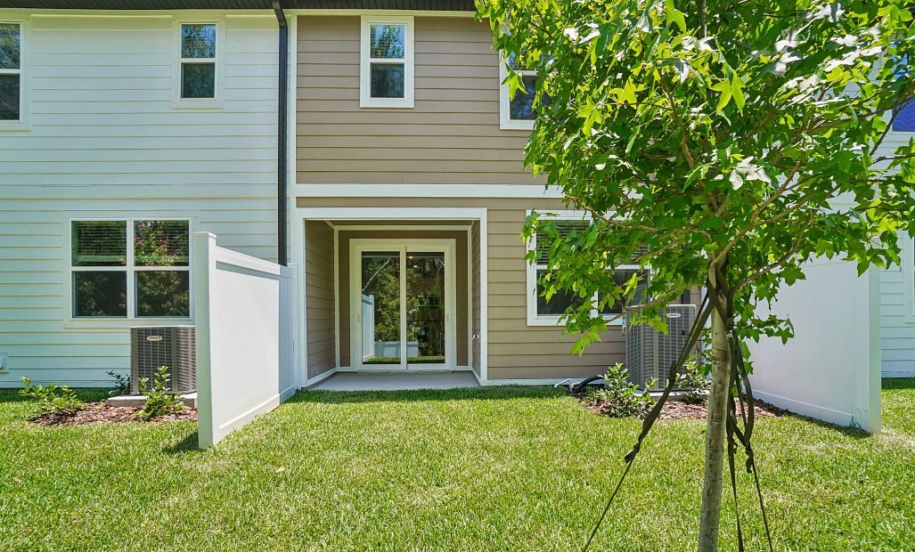 Large backyard with privacy fence