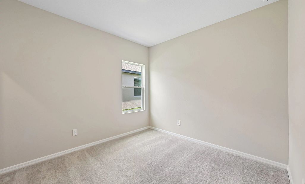 Bedroom 2 is located a little further down the front foyer