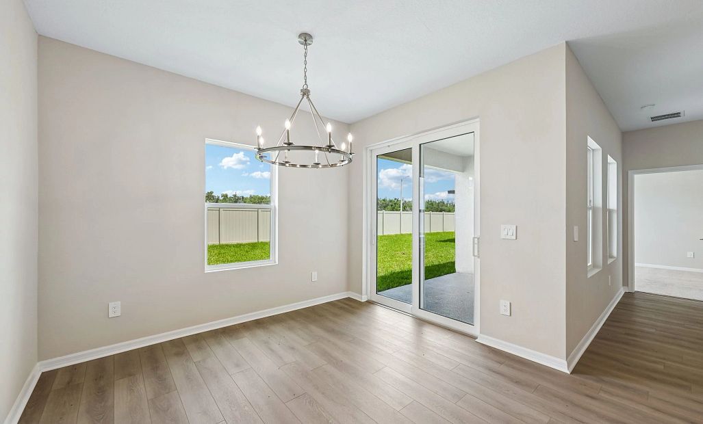 Off the kitchen you will find the dining room which looks out on to the covered lanai