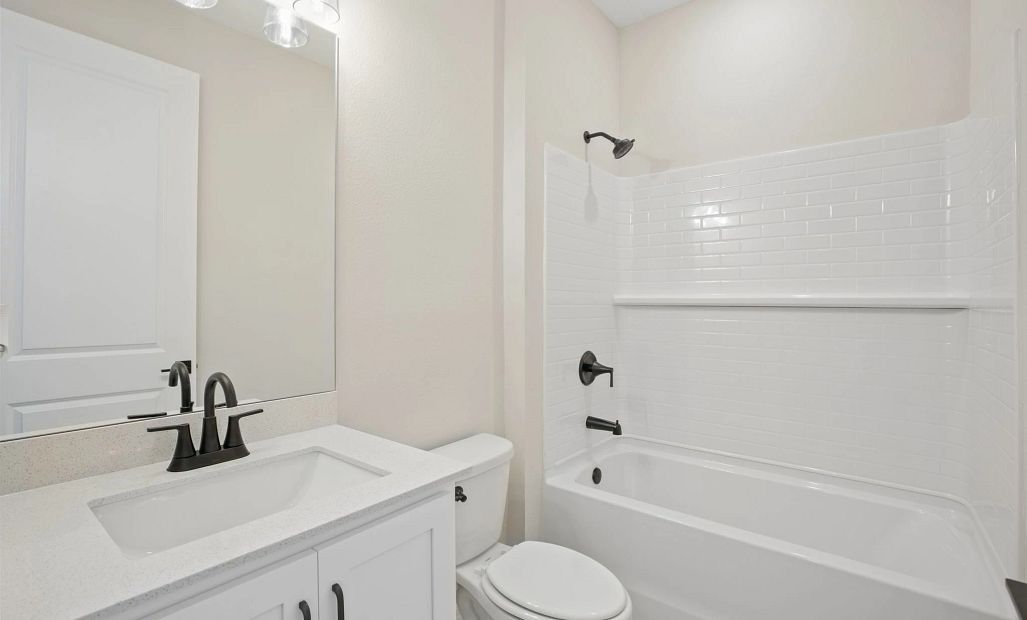Bathroom 2 is located off the hallway near bedroom 2 and 3 and features aspects of AW Collection®