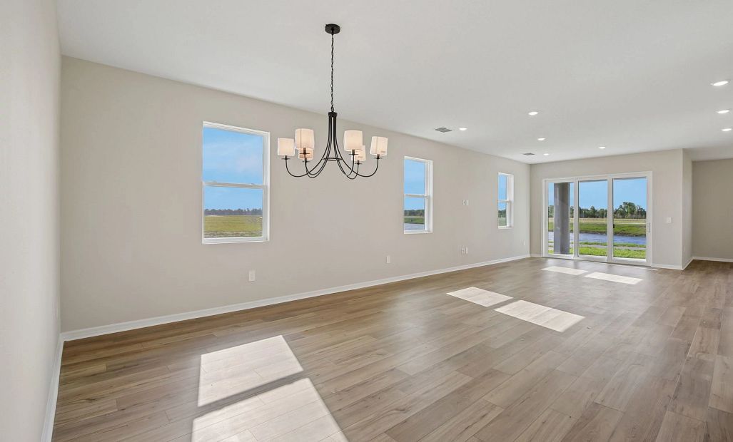After you continue down the foyer you are welcomed into the open concept dining and living spaces