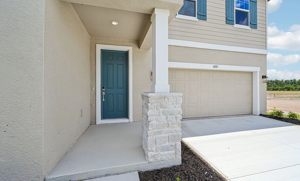 Covered front porch and two car garage