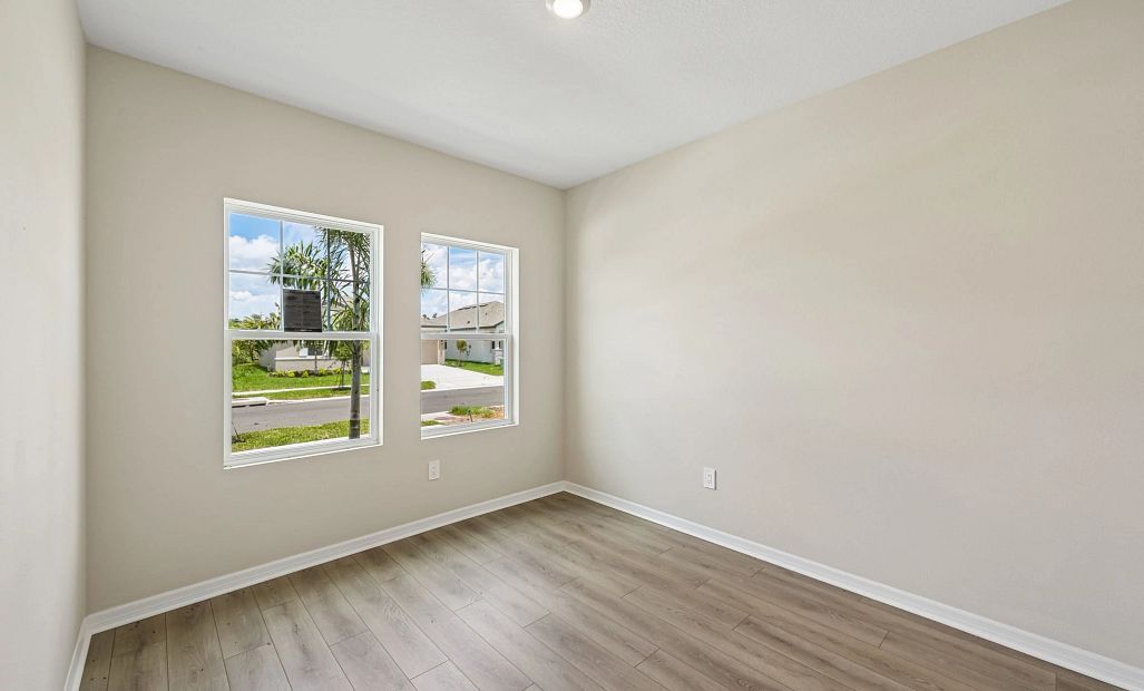 The flex room in the front of the home is perfect for an office, playroom or at home gym