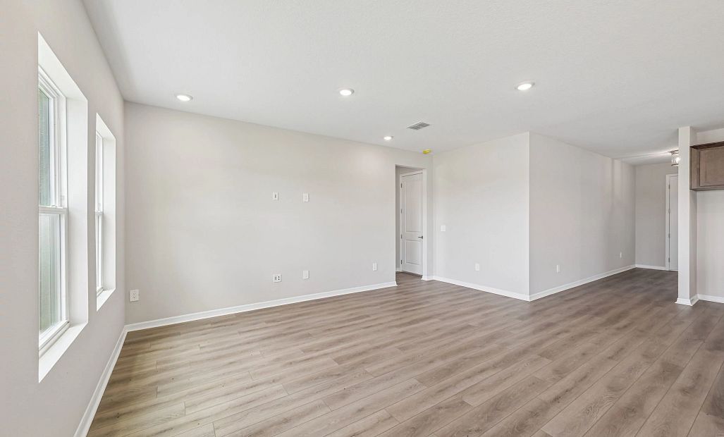The family room space is large and perfect for staying connected with the rest of the room