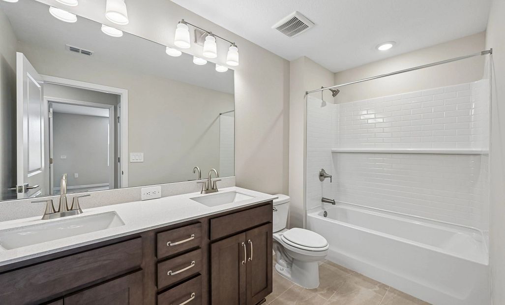 Bathroom 2 is located near all the secondary bedrooms and features aspects of AW Collection®