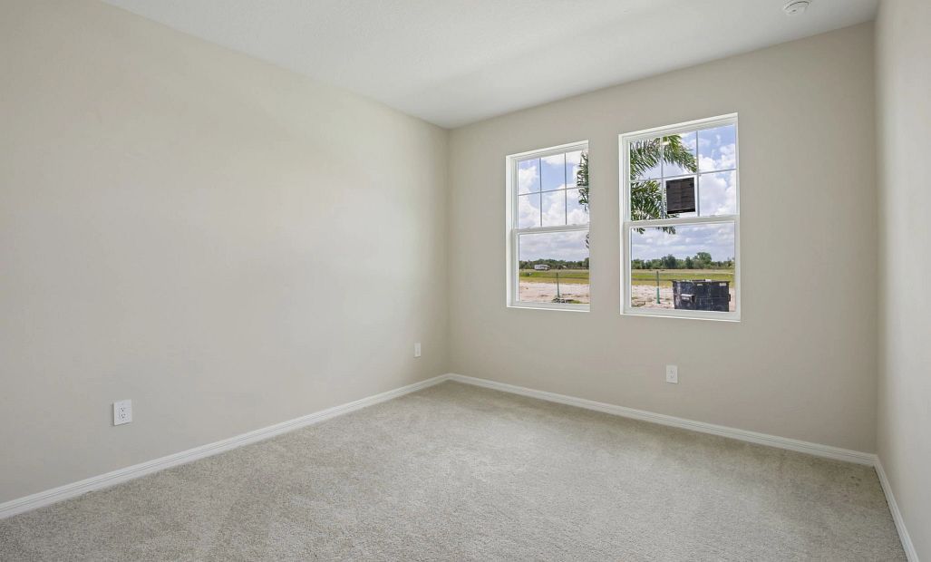 Bedroom 3 is located at the front of the home