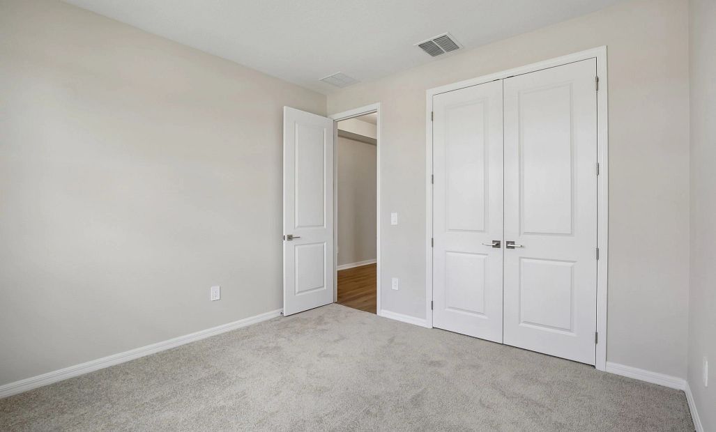 Bedroom 3 features a double door closet