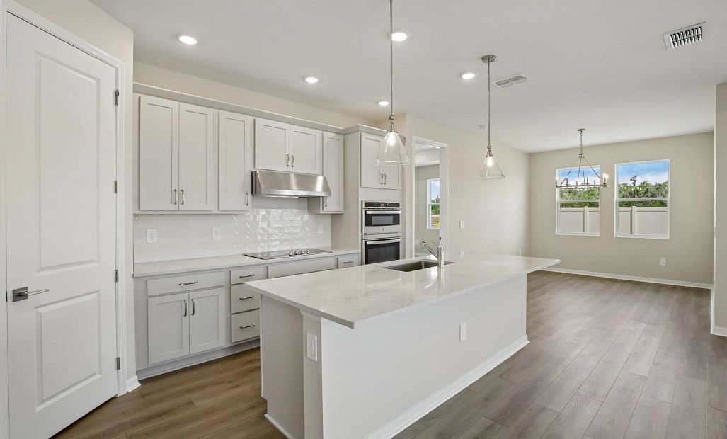 This stunning kitchen featuring our AW Collection® Milan has beautiful whites and grays that truly