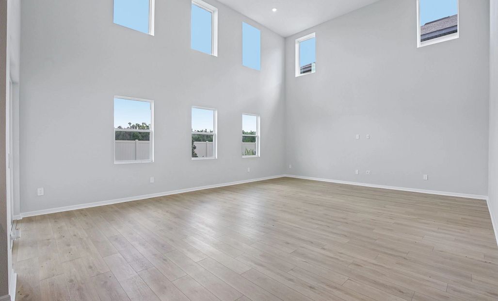The two-story great room with eight windows makes this space truly unique