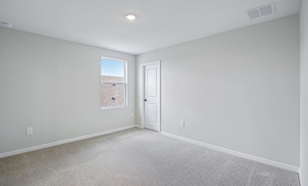 Bedroom 3 is a generous size and located off the side of the home