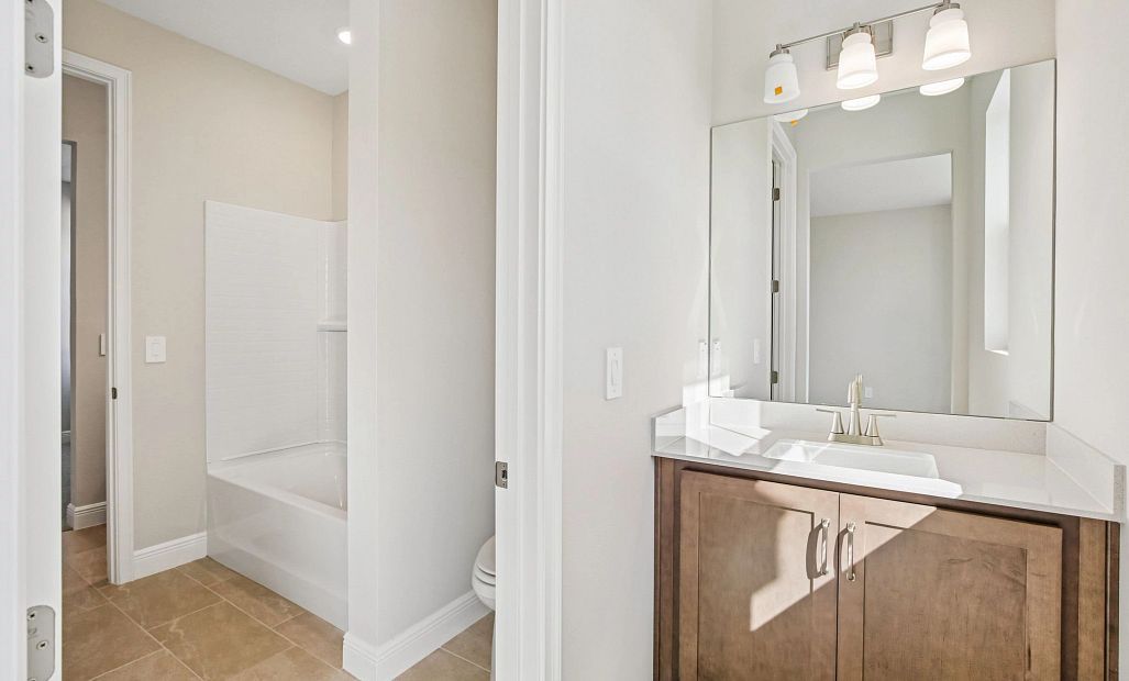 Bedroom 3 is connected to bedroom 2 via a jack and jill bathroom each bedroom has its own sink and