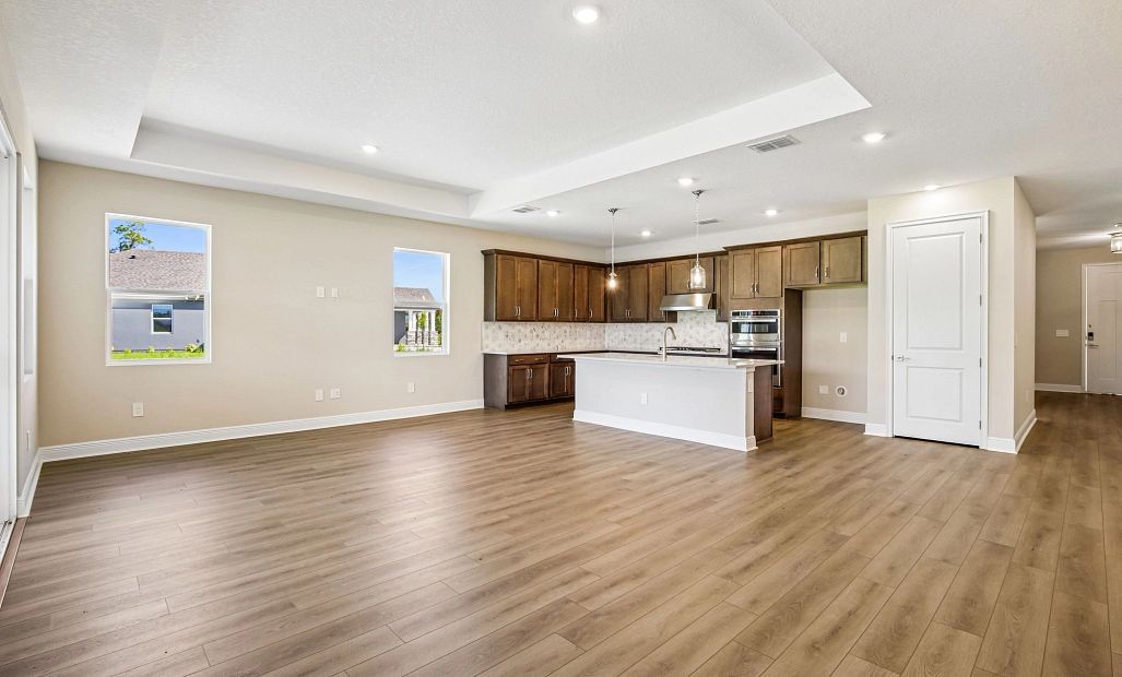The family room welcomes you into this stunning kitchen space perfect for entertaining