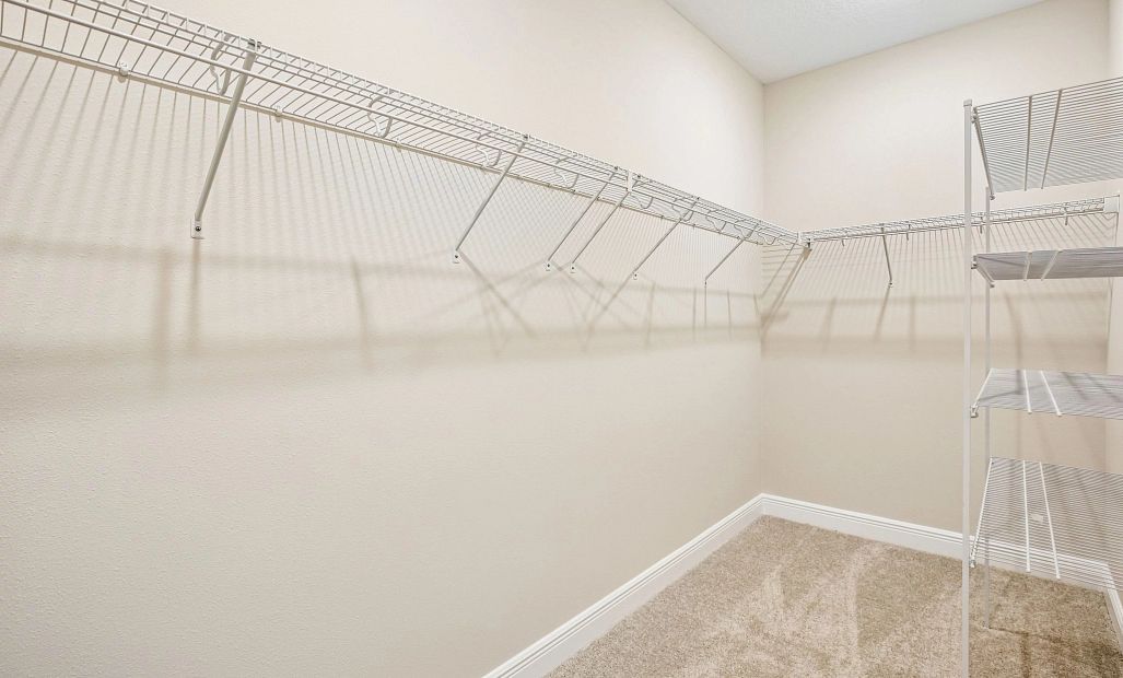 Walk-in closet located off the primary bedroom