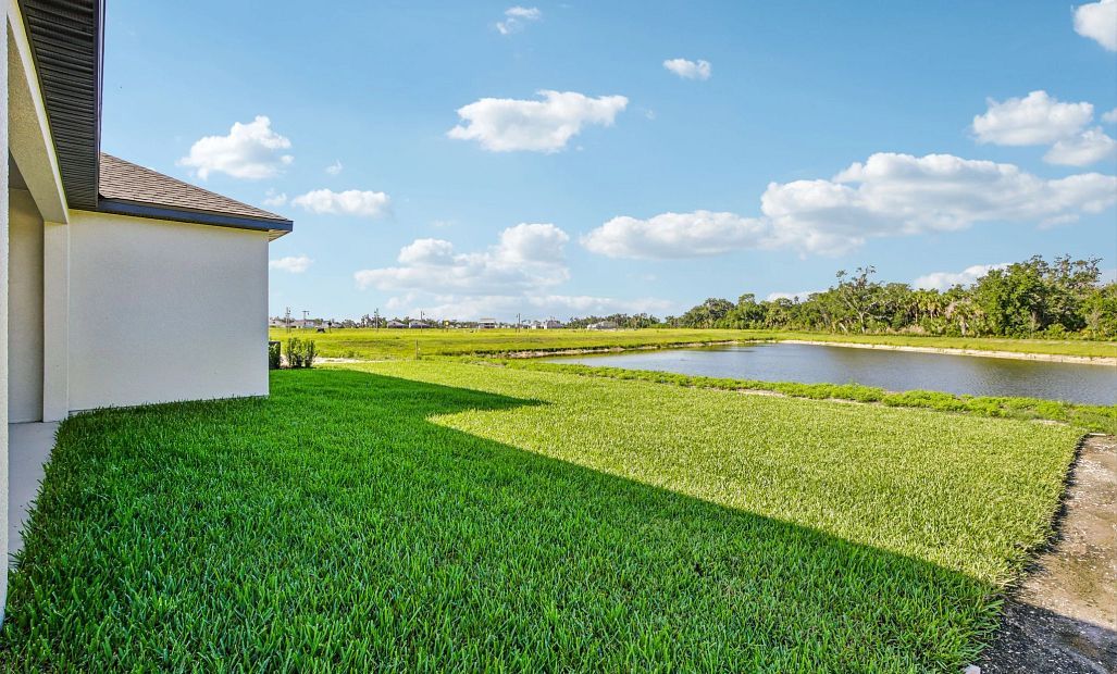 Stunning pond view from the spacious backyard