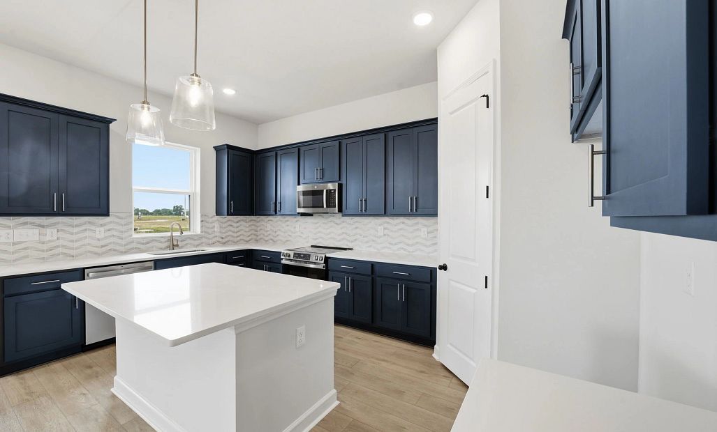 Sample Kitchen photo. Actual structural options and design finishes of home may vary.