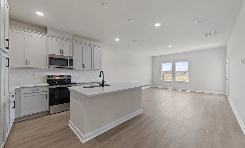 Palmetto floorplan with our Artisan Collection at a nearby community