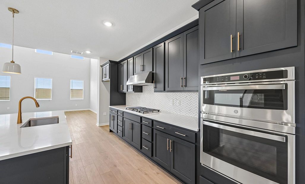 You will continue into this stunning kitchen featuring aspects of AW Collection® Sapphire with a