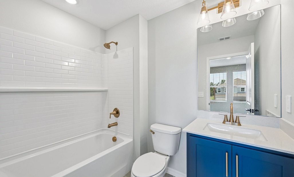 Bedroom 4 has an attached bathroom which features aspects of AW Collection® Sapphire