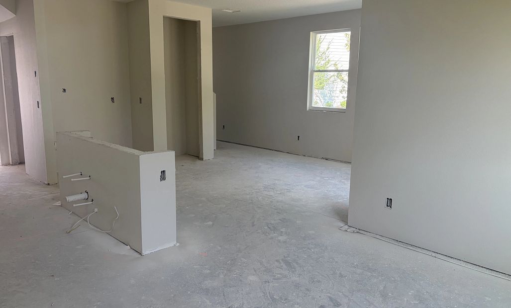 Kitchen opens up into the dining space - under construction