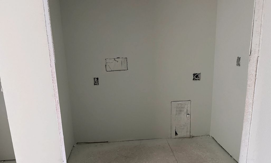 Laundry closet located off the loft space - under construction