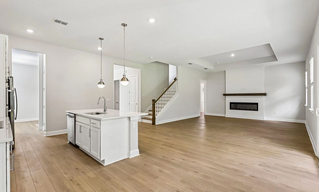 The open kitchen, living and dining space is the perfect space for entertaining