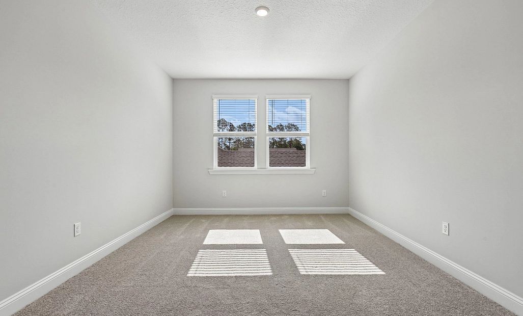 Upstairs is a spacious loft with optimal natural light
