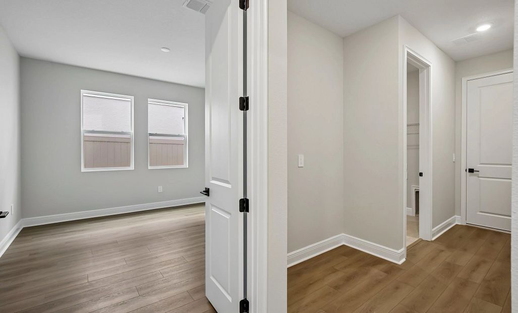 Flex room is off the hallway from the laundry room and access to the double car garage