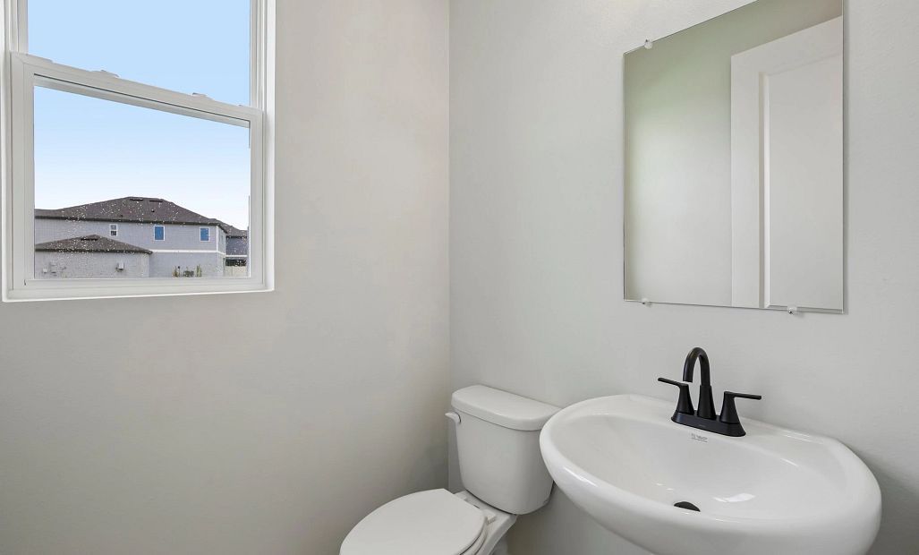 Half bathroom located on the first floor