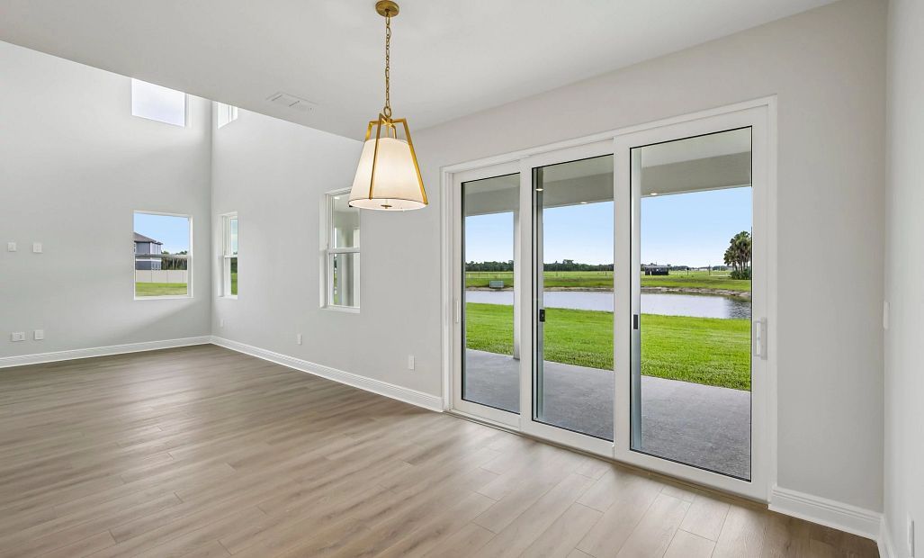 Dining nook between the kitchen and the covered lanai makes the perfect space for entertaining