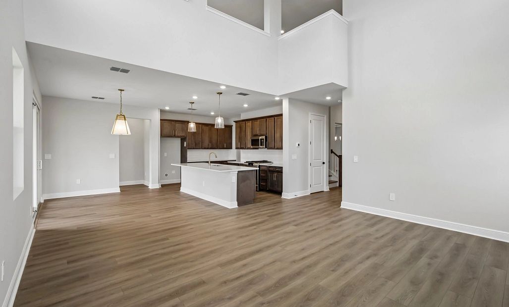This open concept living, dining and kitchen space is the perfect space for entertaining
