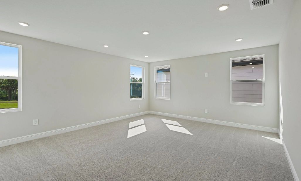 Off the bonus room is a spacious media room