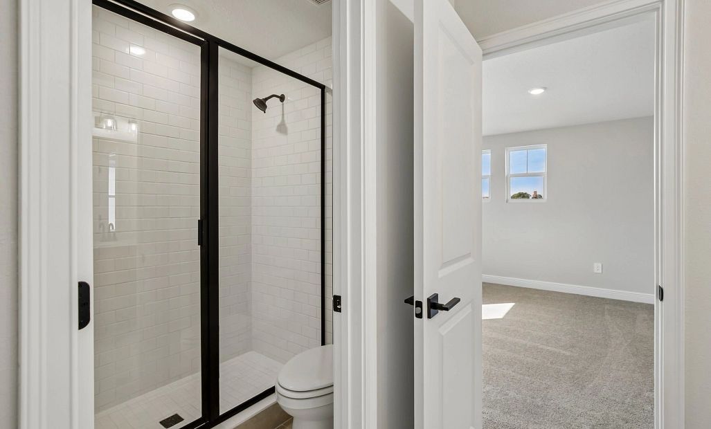 Bathroom 2 has a walk- in shower