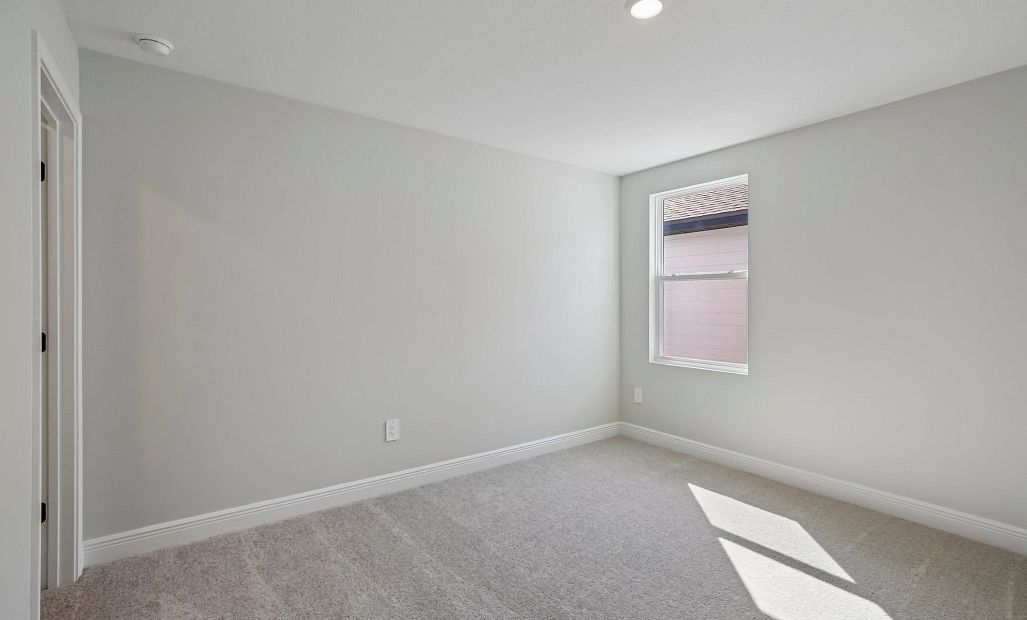 Bedroom 4 located on the other side of bathroom 2 also features a walk-in closet