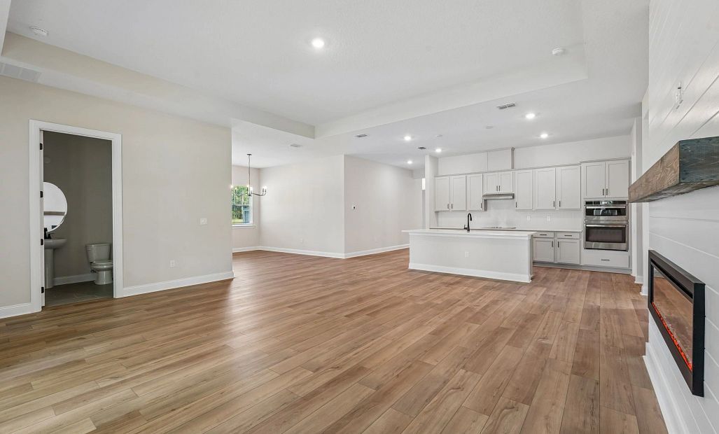 The family room opens up into the kitchen and dining space