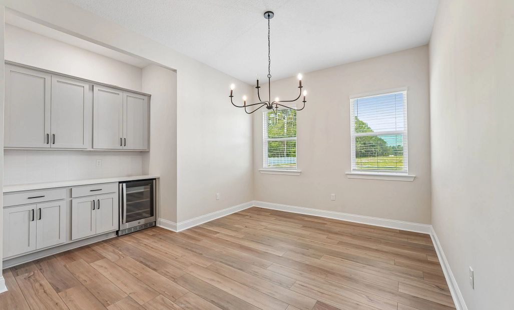 The dining room is spacious and has two windows for optimal lighting